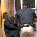Photo: Teacher handcuffed, removed from school board meeting after asking about teacher pay