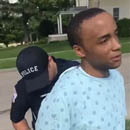 Photo: Illinois cops arrest man for being hospitalized while black