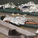 Photo: Feds holding 12,800 migrant children in detention centers