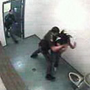 Photo: Caught On Tape: Cop Attacks Teen Girl In Cell
