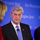 Photo: Mississippi governor signs law allowing businesses to refuse service to gay people
