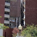 Photo: Explosion rocks University of Nevada dorm in Reno blowing out windows and scattering debris on to the street below