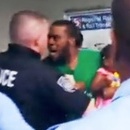 Photo: Mob of Philly cops assault man holding crying baby for not paying his $2.25 transit fare